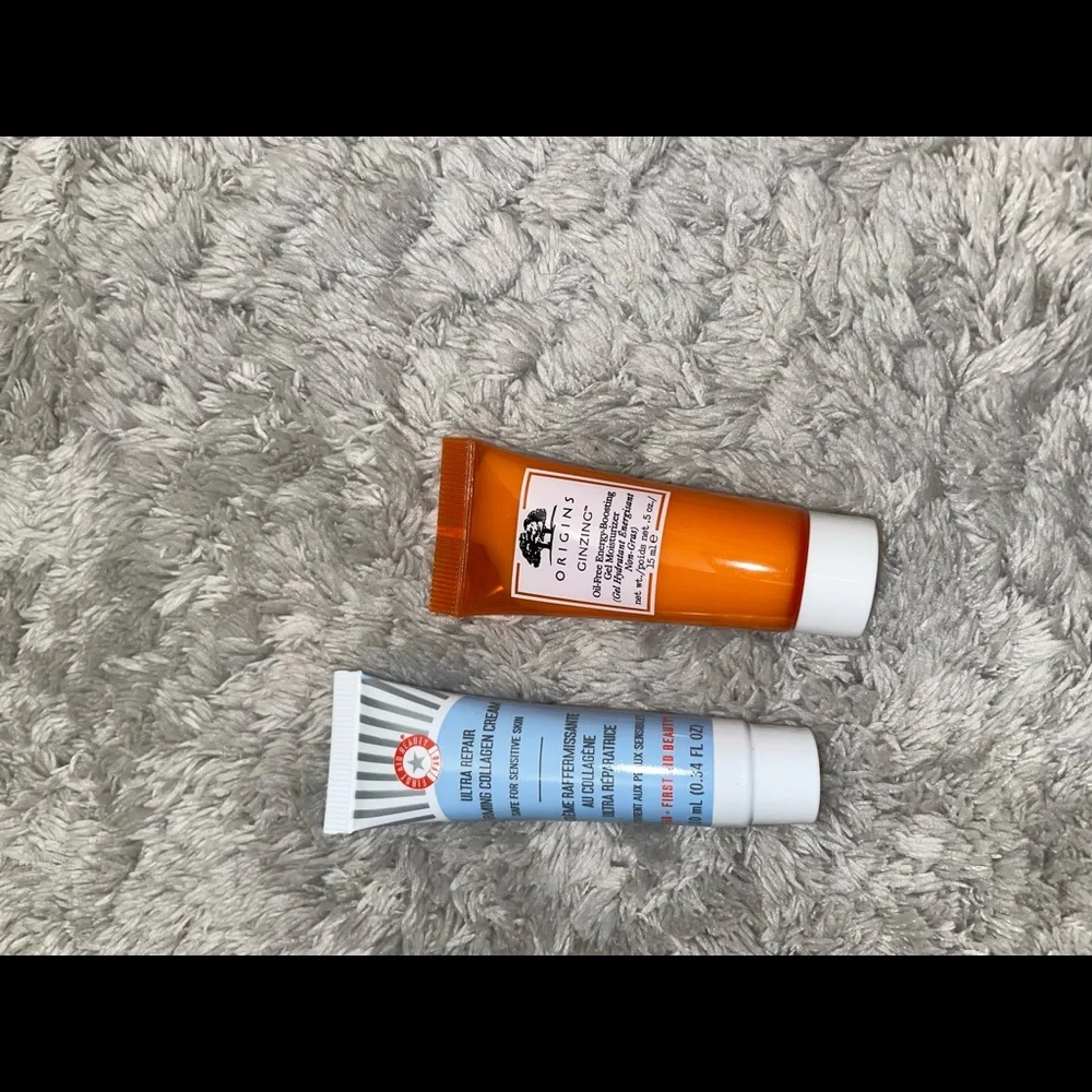 Origins ginseng moistuirzer and first aid beauty ultra repair collagen cream